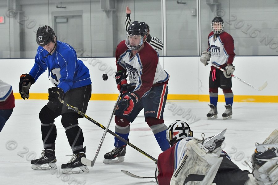 Wheaton College Men\'s Ice Hockey vs Middlesex Community College. - Photo By: KEITH NORDSTROM